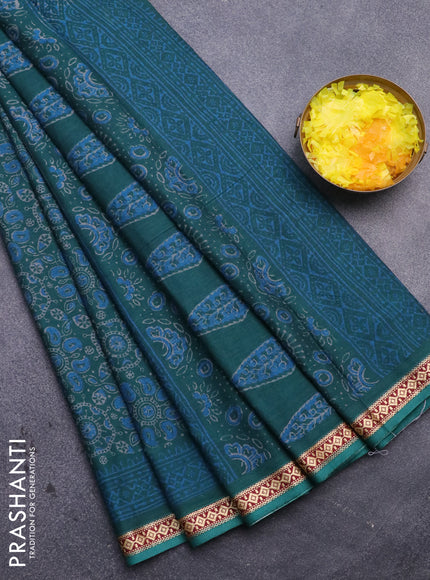 Muslin cotton saree green with allover ajrakh prints and thread woven border