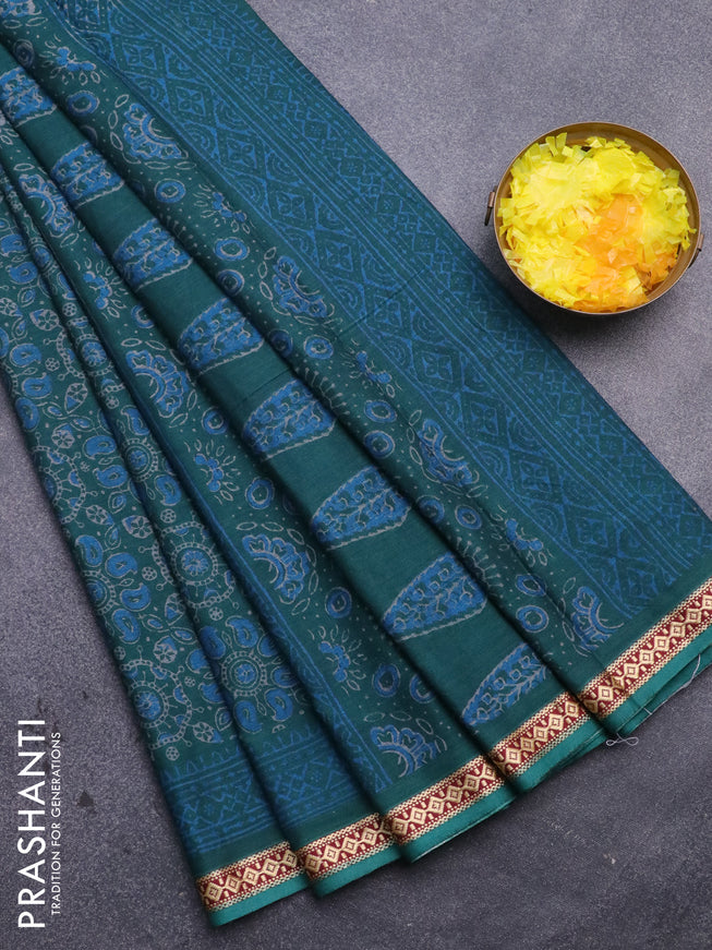 Muslin cotton saree green with allover ajrakh prints and thread woven border