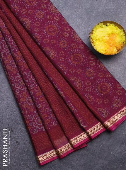 Muslin cotton saree magenta pink with allover ajrakh prints and thread woven border