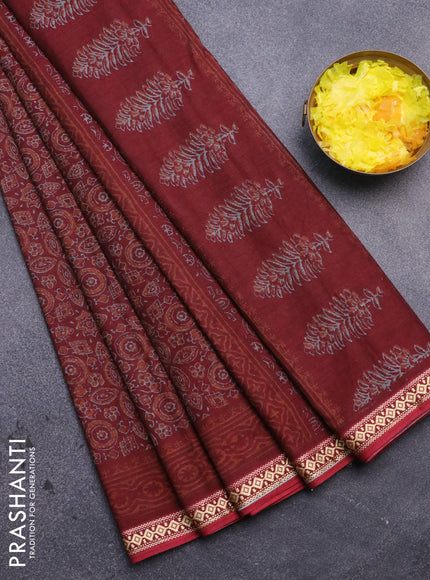 Muslin cotton saree maroon with allover ajrakh prints and thread woven border