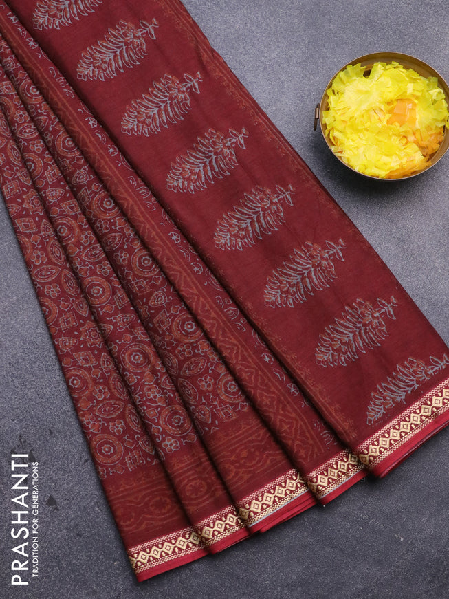 Muslin cotton saree maroon with allover ajrakh prints and thread woven border