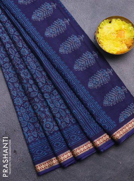 Muslin cotton saree blue with allover ajrakh prints and thread woven border