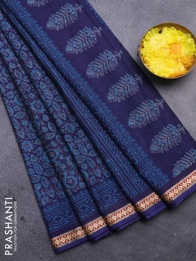 Muslin cotton saree blue with allover ajrakh prints and thread woven border