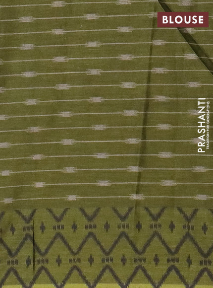 Muslin cotton saree sap green and grey with allover prints and small zari woven border