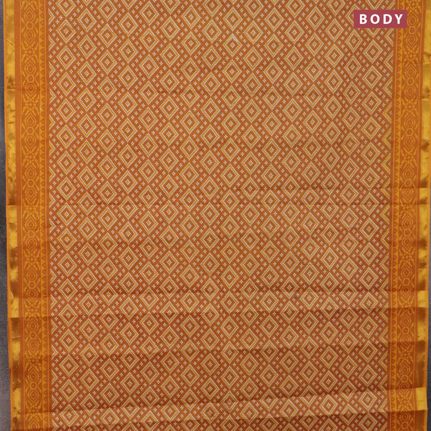 Muslin cotton saree mustard yellow with allover ikat prints and small zari woven border