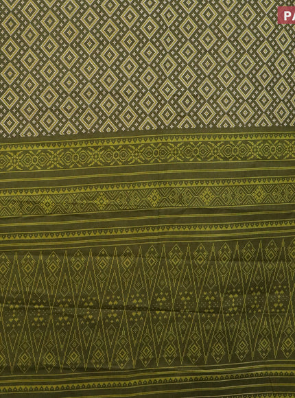 Muslin cotton saree sap green with allover ikat prints and small zari woven border