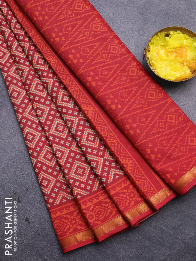 Muslin cotton saree red with allover ikat prints and small zari woven border