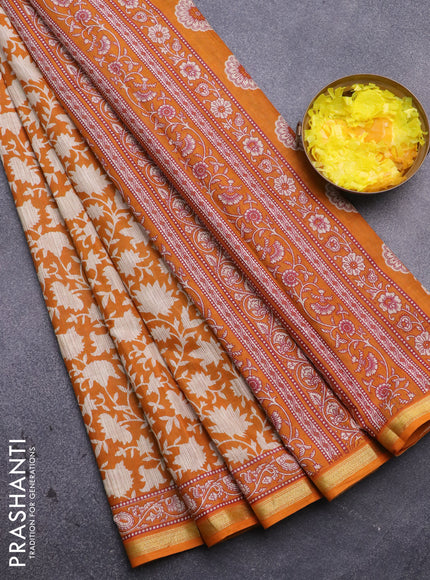 Muslin cotton saree mustard yellow and beige with allover prints and small zari woven border