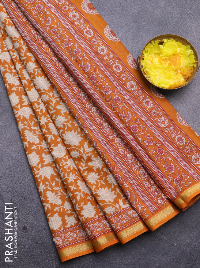 Muslin cotton saree mustard yellow and beige with allover prints and small zari woven border