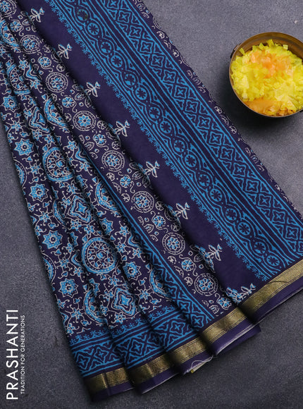 Muslin cotton saree blue with allover ajrakh prints and small zari woven border