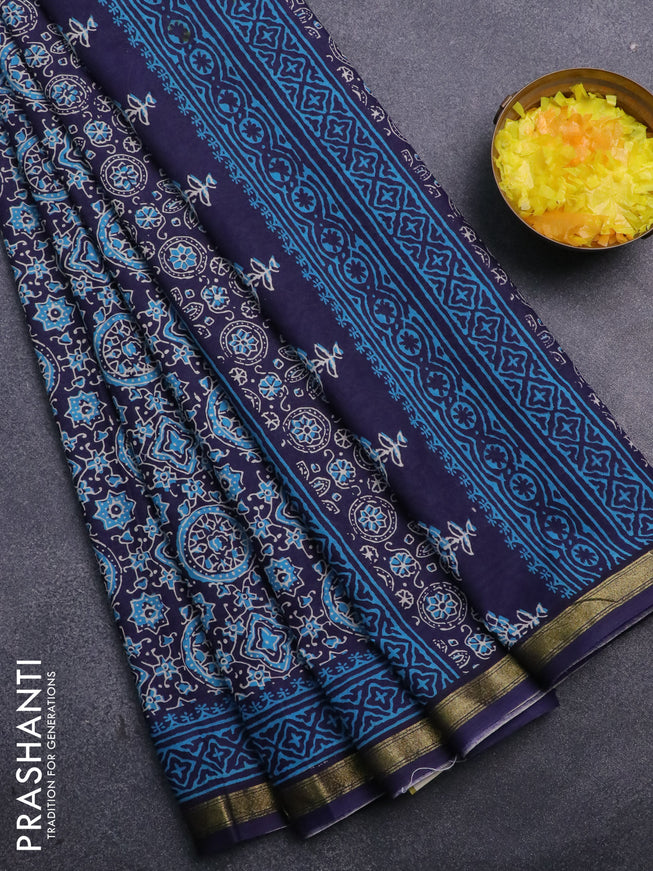 Muslin cotton saree blue with allover ajrakh prints and small zari woven border