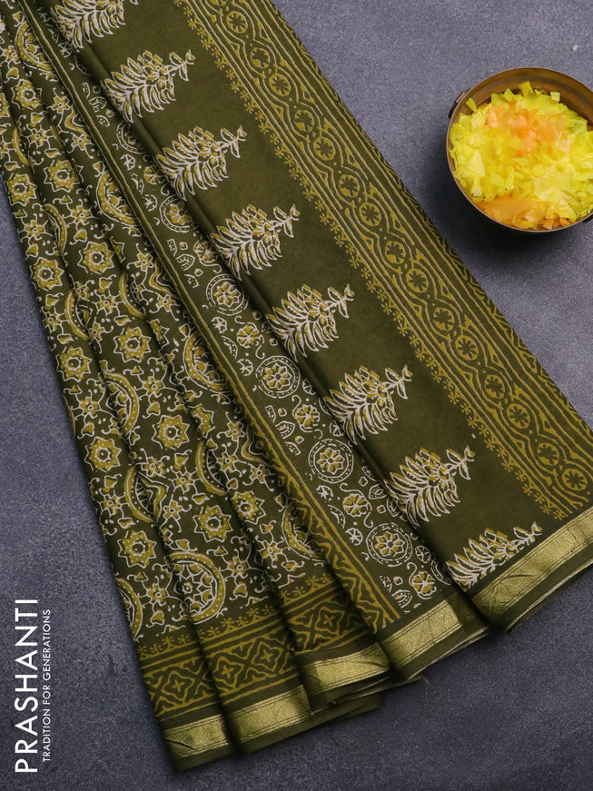 Muslin cotton saree sap green with allover ajrakh prints and small zari woven border