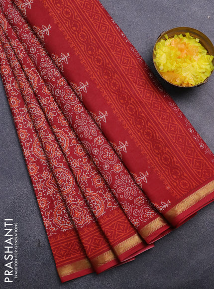 Muslin cotton saree red with allover ajrakh prints and small zari woven border