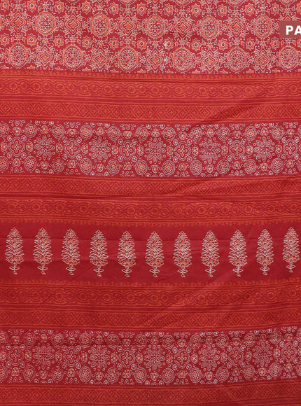 Muslin cotton saree red with allover ajrakh prints and small zari woven border