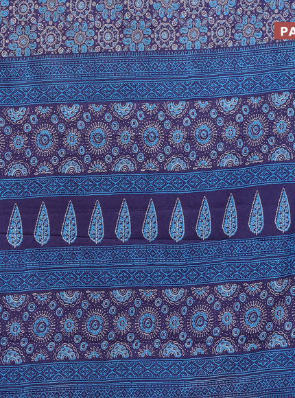 Muslin cotton saree blue with allover ajrakh prints and small zari woven border