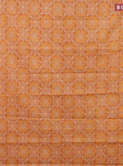 Muslin cotton saree orange with allover ajrakh prints and small zari woven border