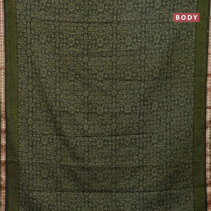 Muslin cotton saree sap green with allover ajrakh prints and thread woven border