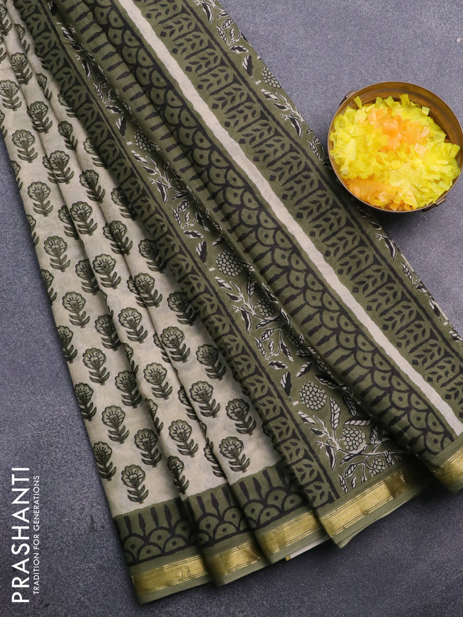 Muslin cotton saree cream and green with allover floral butta prints and small zari woven border