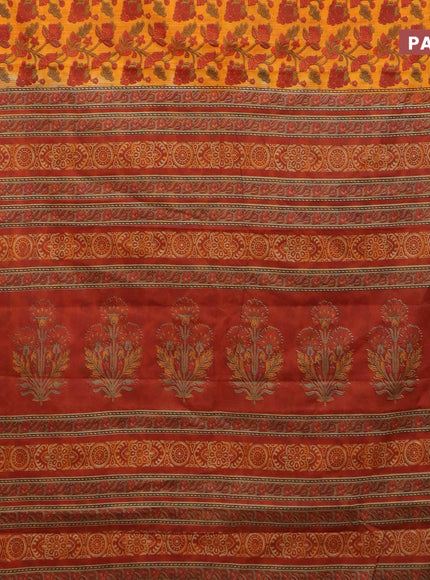 Muslin cotton saree orange and brown with allover kalamkari prints and small zari woven border