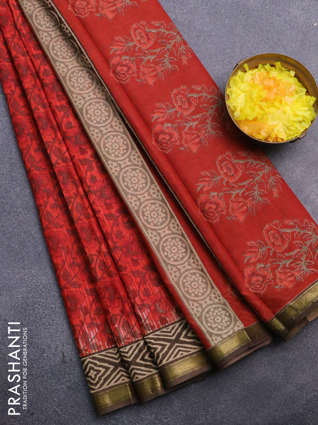 Muslin cotton saree reddish orange and brown with allover floral prints and small zari woven border