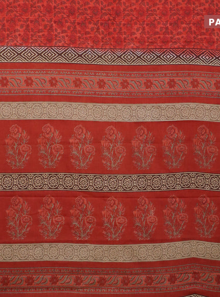 Muslin cotton saree reddish orange and brown with allover floral prints and small zari woven border