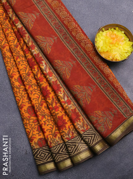 Muslin cotton saree orange and brown with allover kalamkari prints and small zari woven border