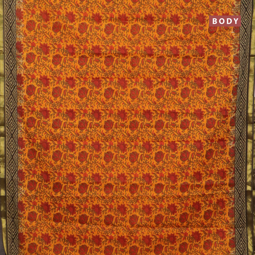 Muslin cotton saree orange and brown with allover kalamkari prints and small zari woven border