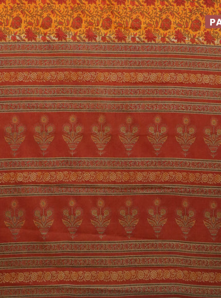 Muslin cotton saree orange and brown with allover kalamkari prints and small zari woven border