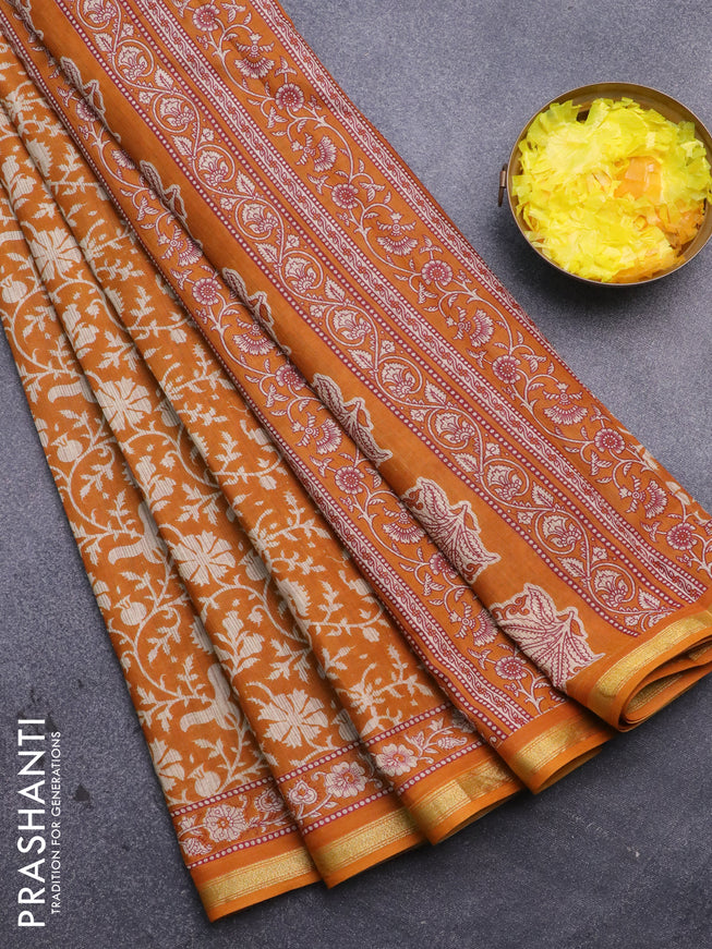 Muslin cotton saree mustard shade and beige with allover prints and small zari woven border