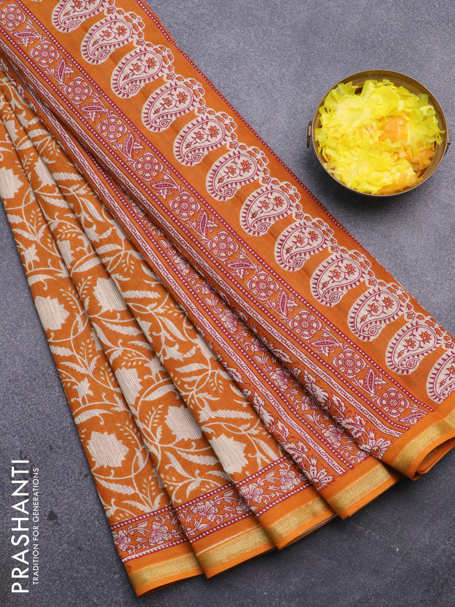 Muslin cotton saree mustard yellow and beige with allover prints and small zari woven border