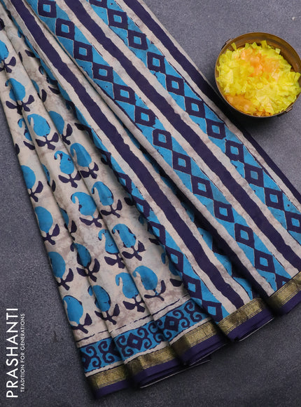 Muslin cotton saree cream and blue with allover paisley butta prints and small zari woven border