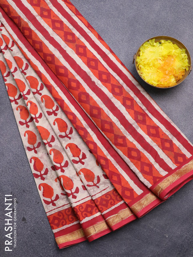 Muslin cotton saree cream and orange red with allover paisley butta prints and small zari woven border