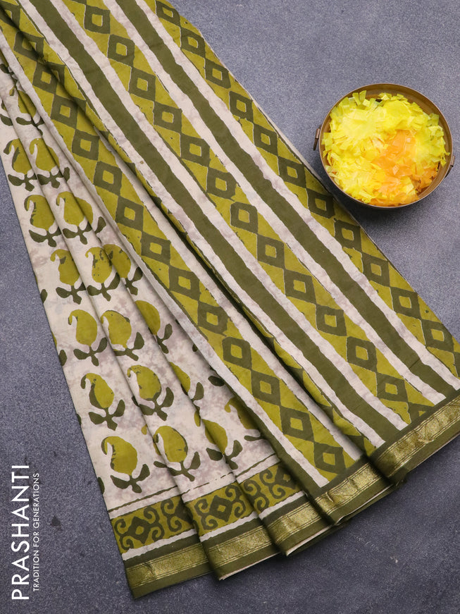 Muslin cotton saree cream and sap green with allover paisley butta prints and small zari woven border