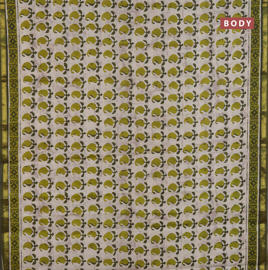 Muslin cotton saree cream and sap green with allover paisley butta prints and small zari woven border