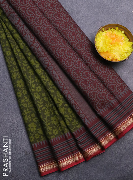 Muslin cotton saree sap green with allover floral prints and thread woven border