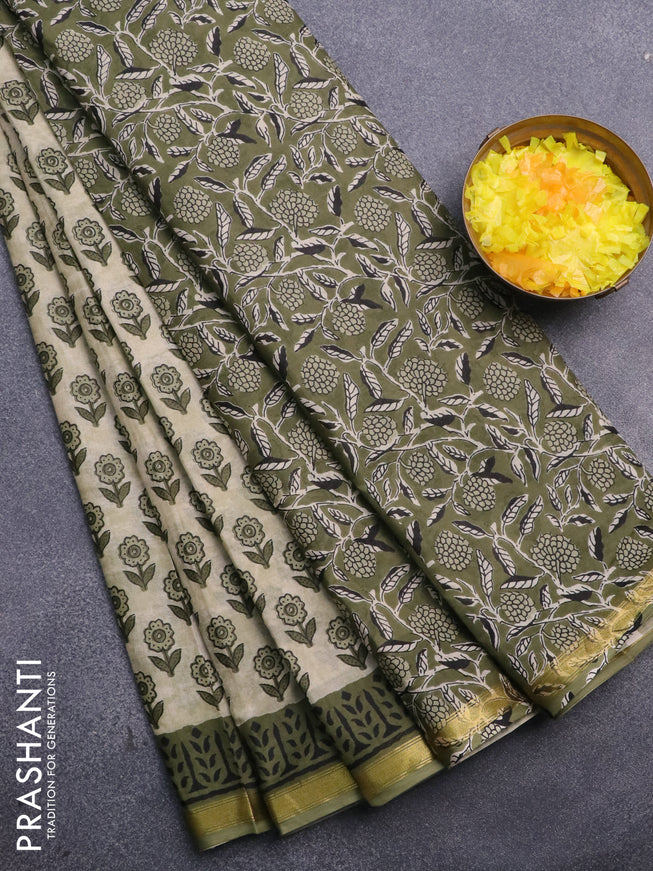 Muslin cotton saree cream and green with allover floral butta prints and small zari woven border