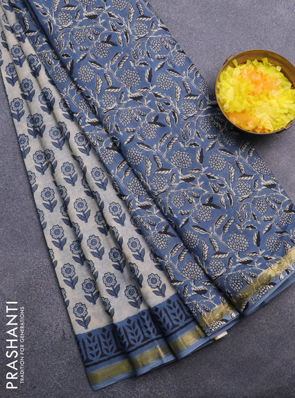 Muslin cotton saree cream and blue with allover floral butta prints and small zari woven border