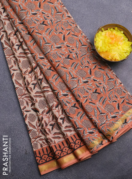 Muslin cotton saree sandal and orange with allover floral prints and small zari woven border