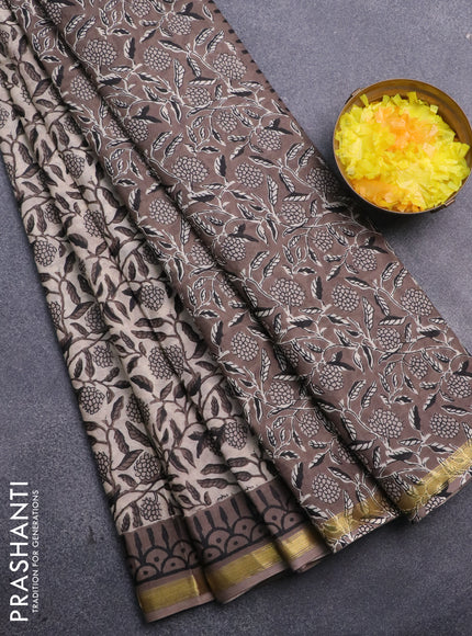 Muslin cotton saree beige and grey with allover floral prints and small zari woven border