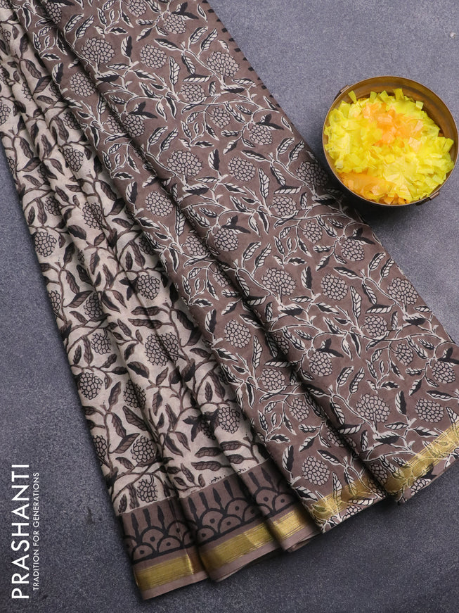 Muslin cotton saree beige and grey with allover floral prints and small zari woven border