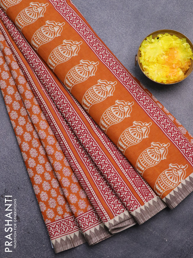 Muslin cotton saree mustard yellow and beige with allover floral prints and printed border