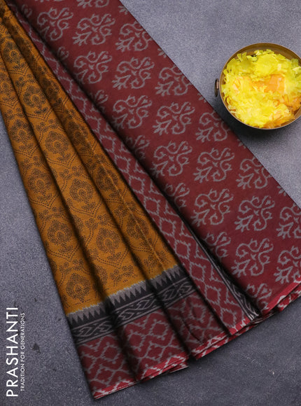 Muslin cotton saree mustard yellow and maroon with allover prints and printed border