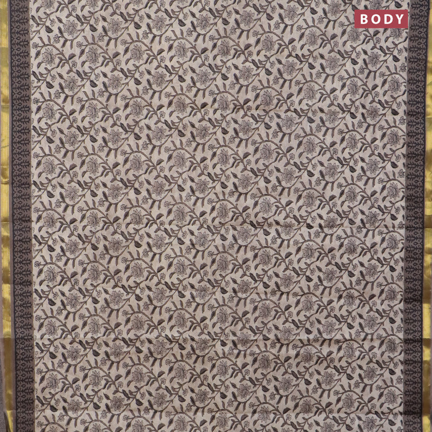 Muslin cotton saree beige and grey with allover floral prints and small zari woven border