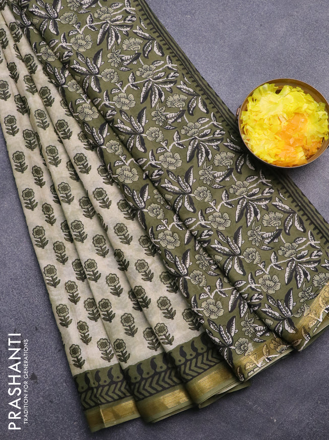 Muslin cotton saree cream and sap green with floral butta prints and zari woven border