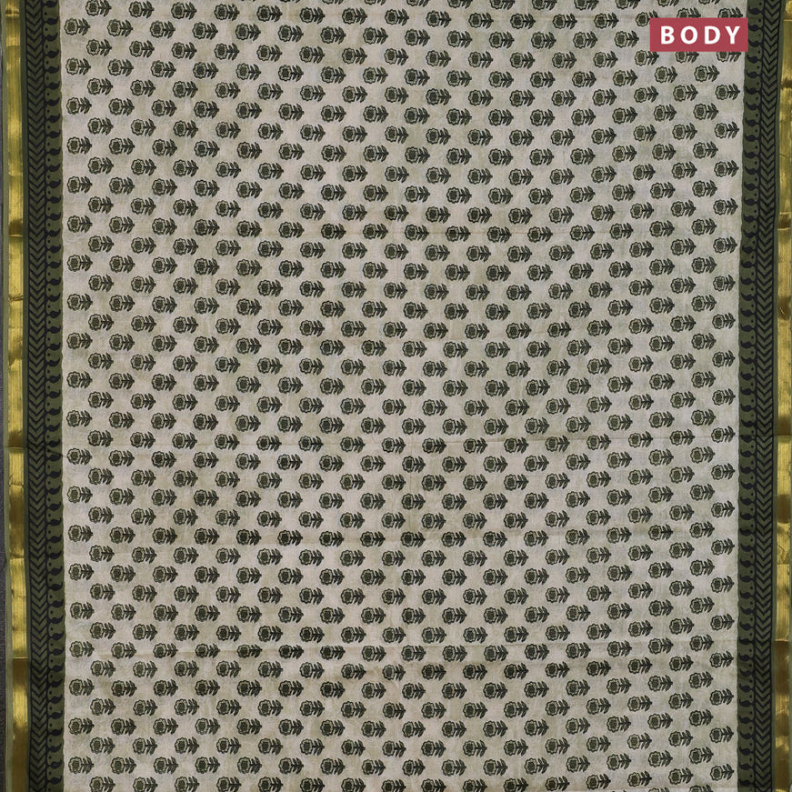 Muslin cotton saree cream and sap green with floral butta prints and zari woven border