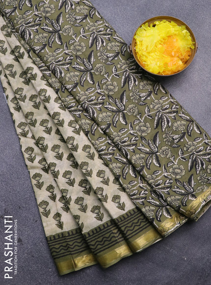 Muslin cotton saree cream and green with allover floral butta prints and small zari woven border