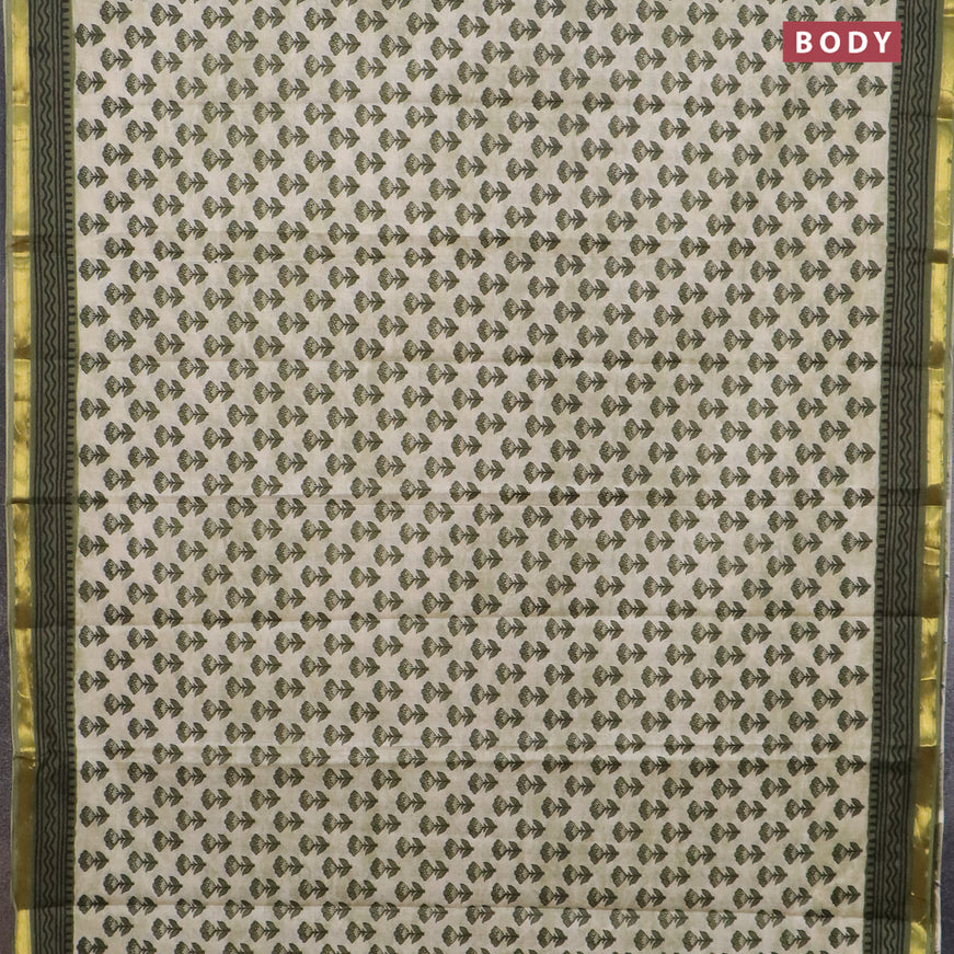 Muslin cotton saree cream and green with allover floral butta prints and small zari woven border