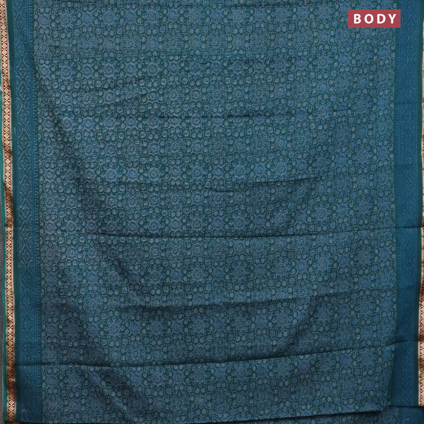 Muslin cotton saree peacock blue with allover ajrakh prints and thread woven border