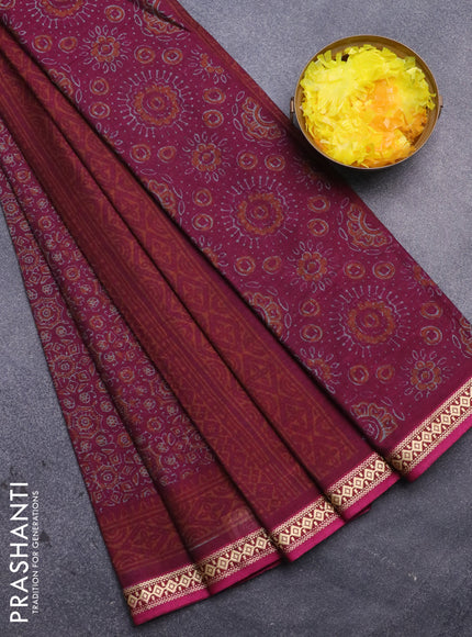 Muslin cotton saree magenta pink with allover ajrakh prints and thread woven border