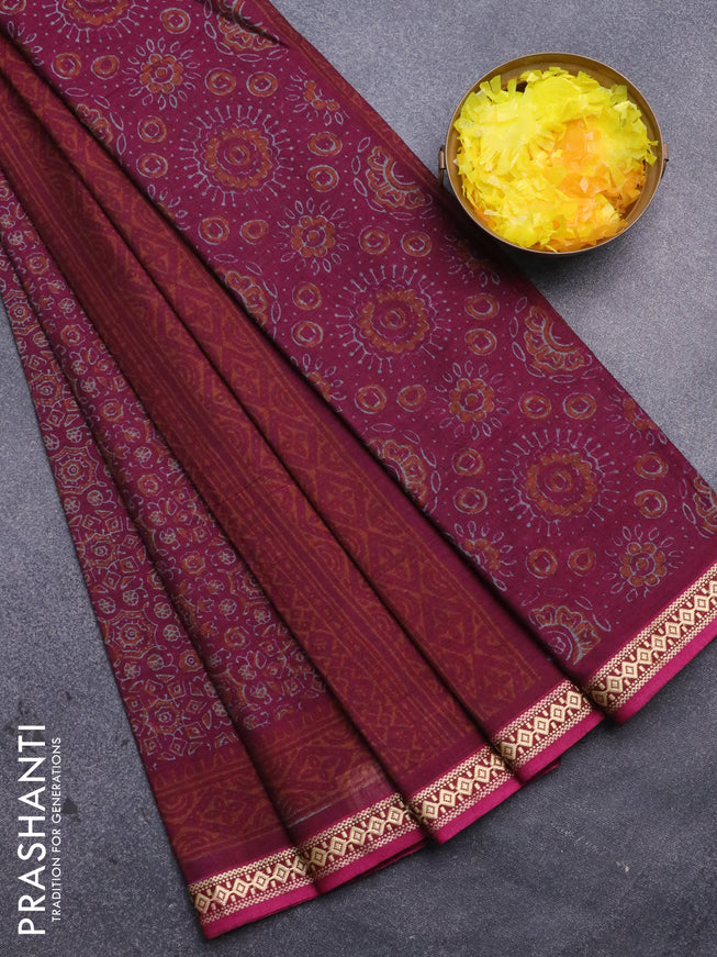 Muslin cotton saree magenta pink with allover ajrakh prints and thread woven border